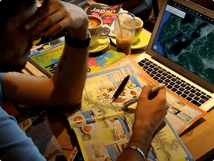 Traveller planning on laptop