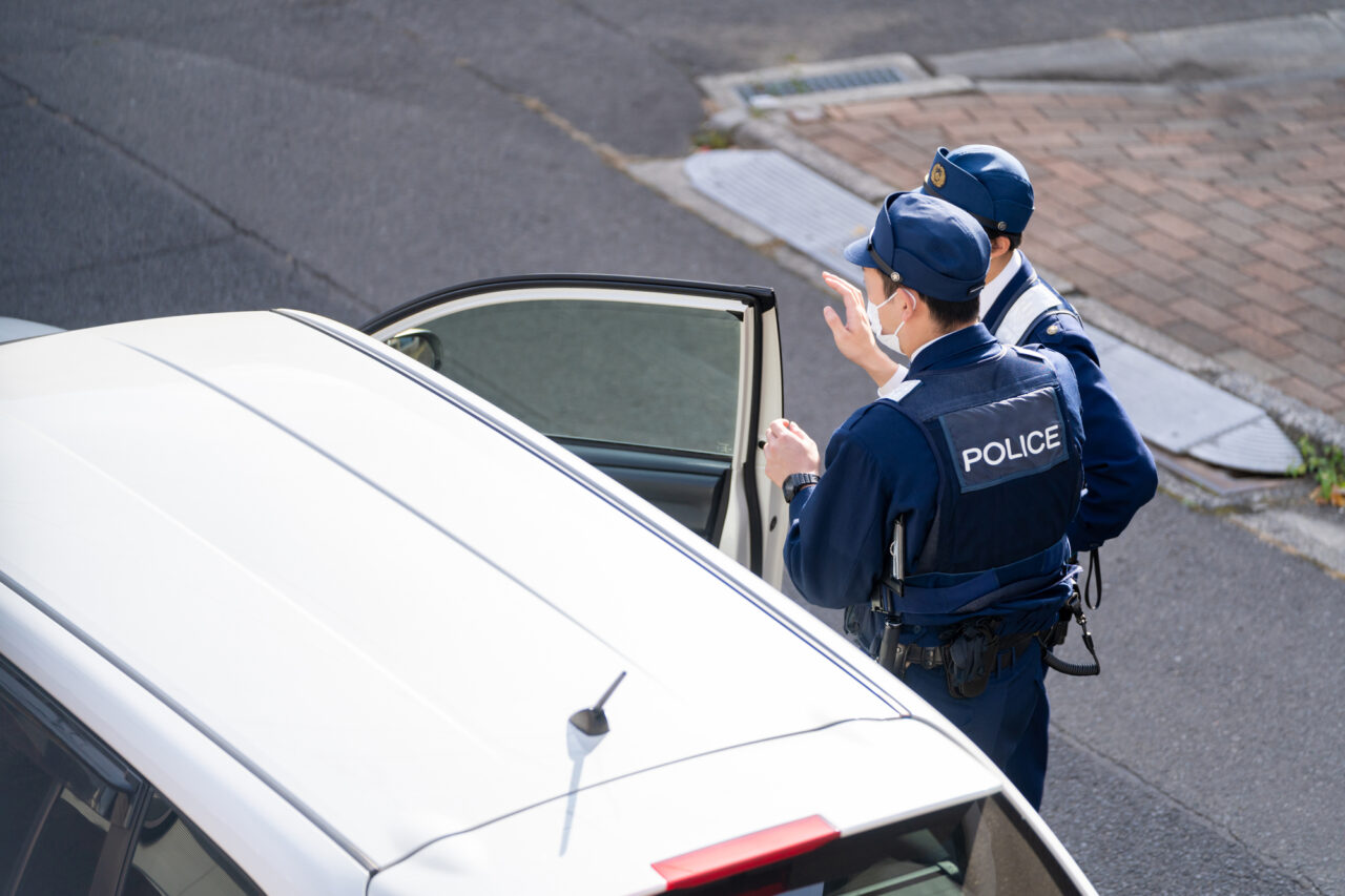 Police in Japan getting out of their car